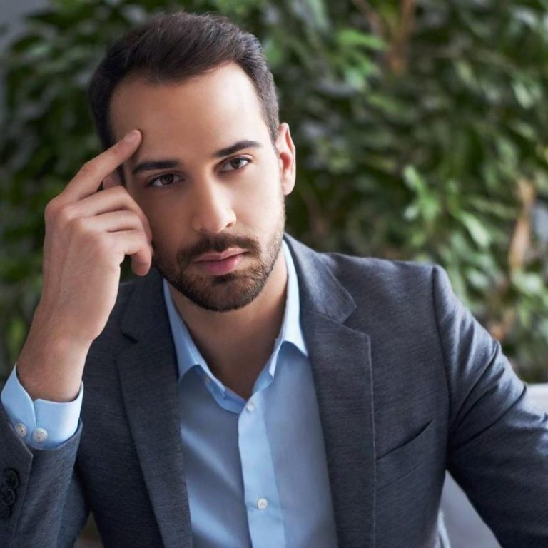 Logo mit dem Text „Gefühl gebunden“ und einem spiralförmigen Symbol in Rot und Gelb.